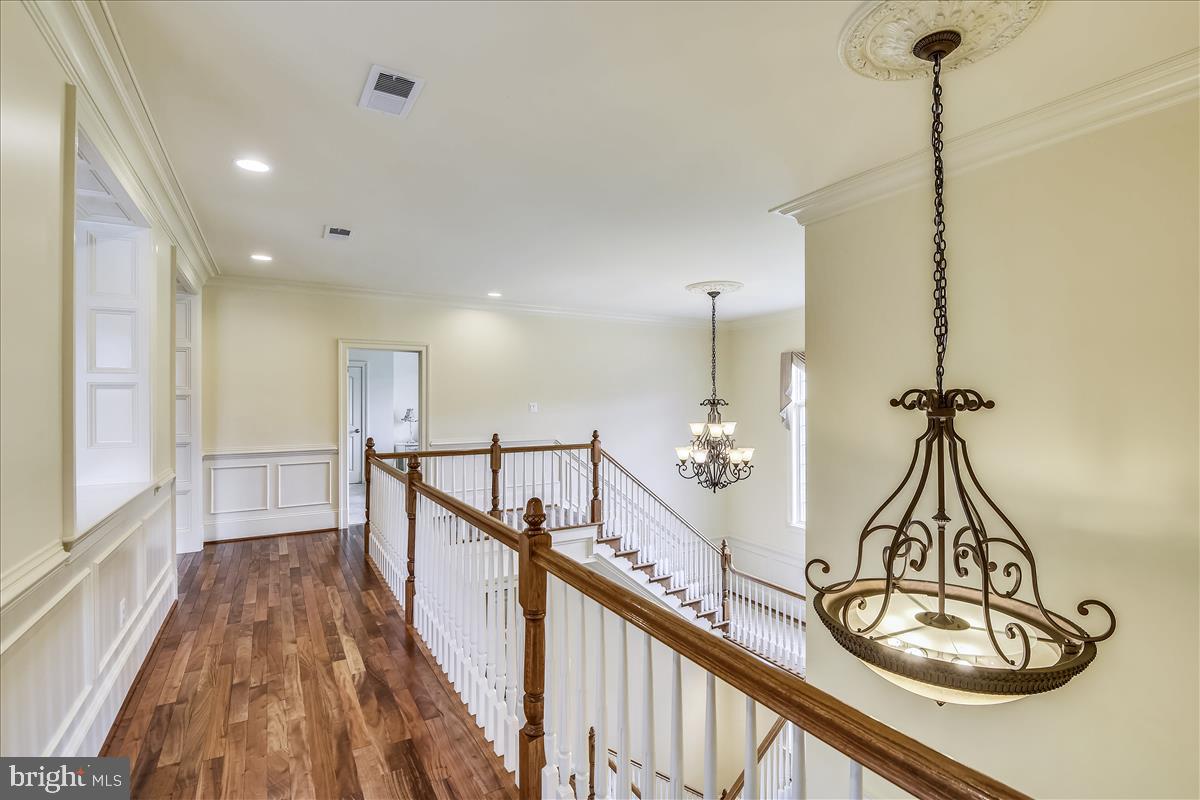 12056 Open Run Road Ellicott City, MD 21042 - Photo 55 of 114 Upstairs walkway with gorgeous flooring