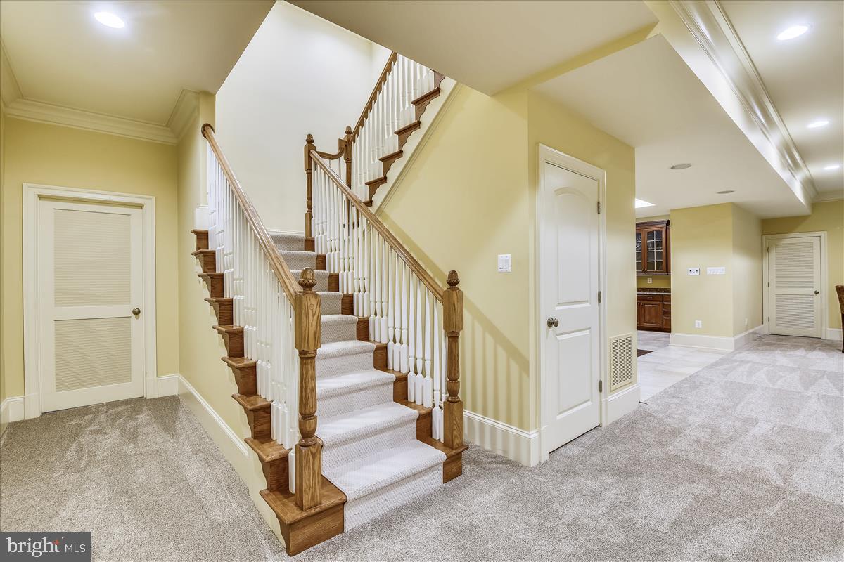 12056 Open Run Road Ellicott City, MD 21042 - Photo 65 of 114 Back stair case into the Lower Level