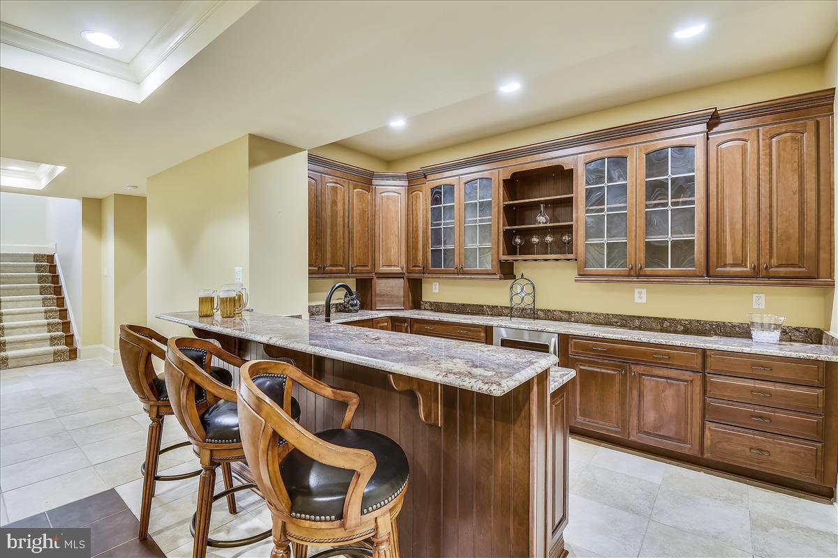 12056 Open Run Road Ellicott City, MD 21042 - Photo 66 of 114 Wet bar and kitchenette on Lower Level