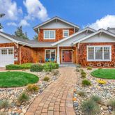 a view of a yard in front of a house