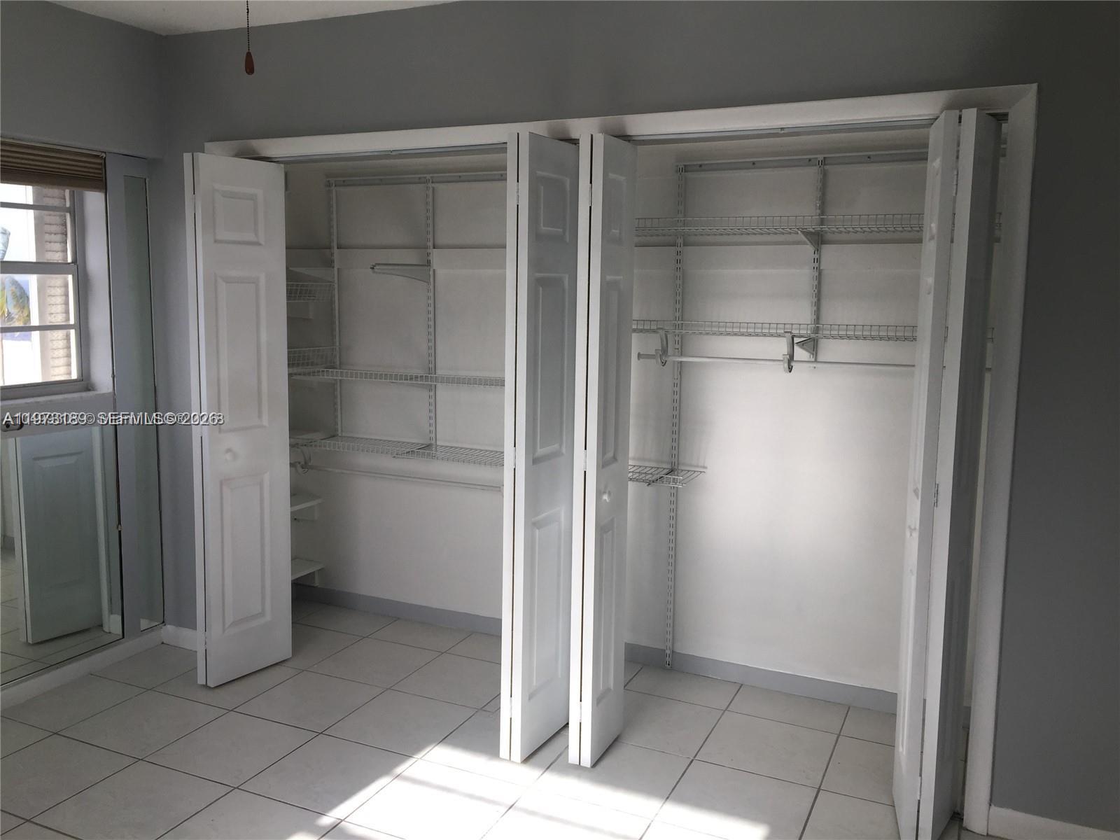 901 South Surf Road, Unit 402 Hollywood, FL 33019 - Photo 24 of 25 a view of an empty room and closet area