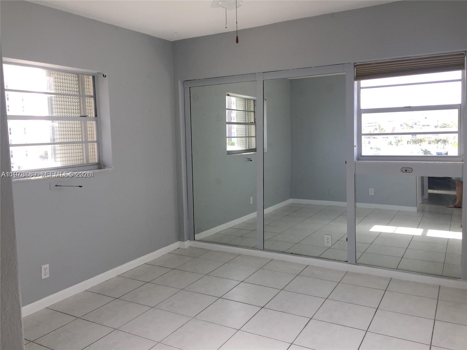 901 South Surf Road, Unit 402 Hollywood, FL 33019 - Photo 8 of 25 a view of an empty room with a window