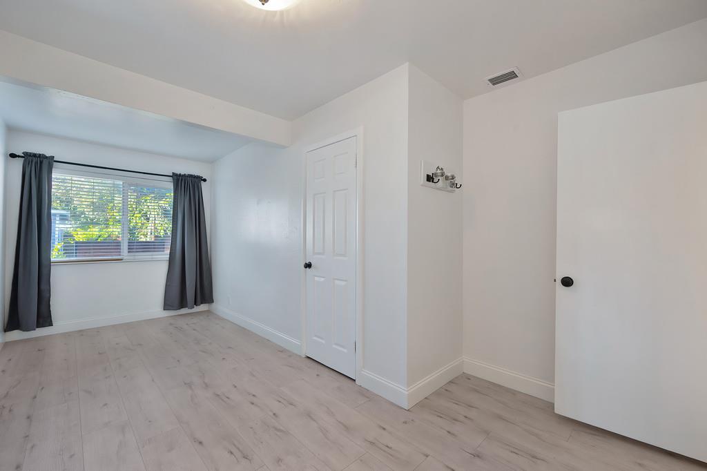 3129 Murchison Way Carmichael, CA 95608 - Photo 19 of 41 Bedroom #1 - door on left is the closet - door on right leads to hallway