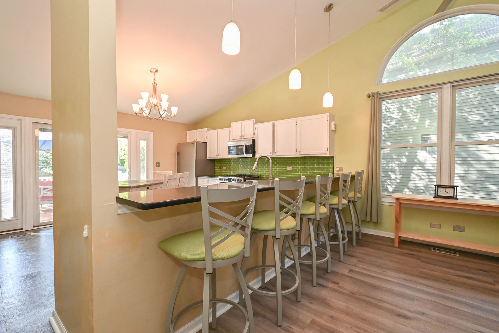 1333 Regency Lane Round Lake, IL 60073 - Photo 11 of 31 a dining room with furniture and wooden floor