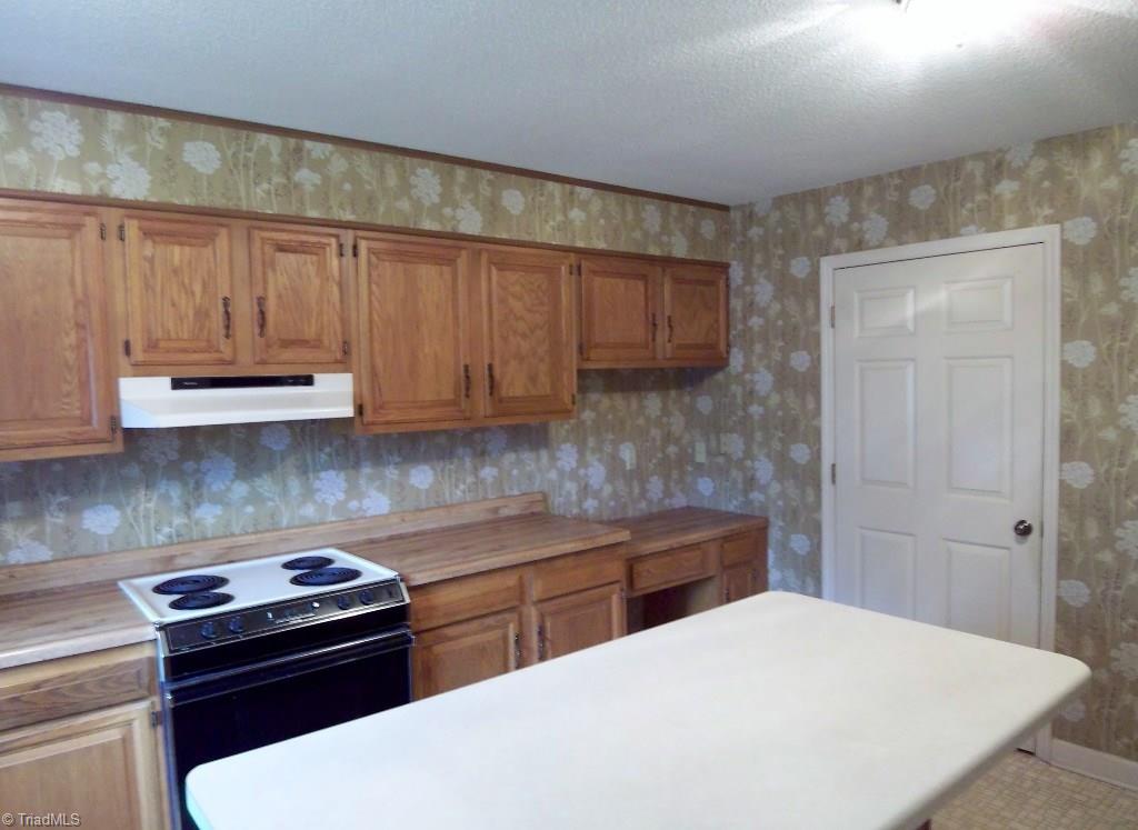 148 Old Mill Road, Unit C High Point, NC 27265 - Photo 3 of 20 Kitchen and Island