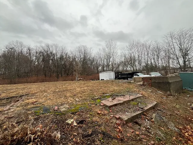 a view of outdoor space with water fountain