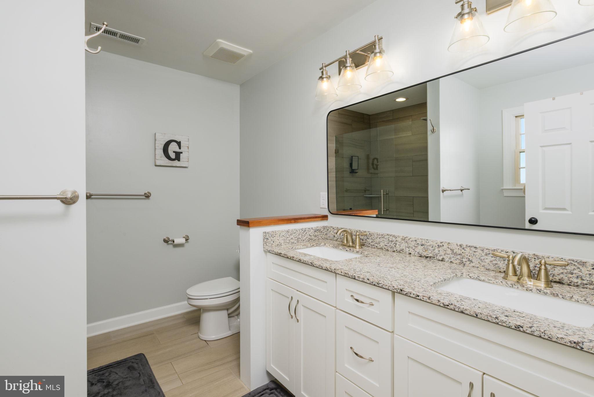 2649 Roberts Station Road Ingleside, MD 21644 - Photo 33 of 47 Modern elegance in a serene bathroom.