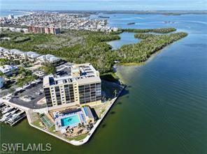 400 Lenell Road, Unit 110 Fort Myers Beach, FL 33931 - Photo 3 of 37 a view of a balcony with an outdoor space