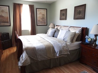 4708 Wolf Road Western Springs, IL 60558 - Photo 12 of 14 a bedroom with a bed and wooden floor