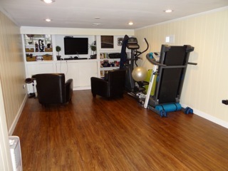 4708 Wolf Road Western Springs, IL 60558 - Photo 13 of 14 a living room with furniture and a flat screen tv