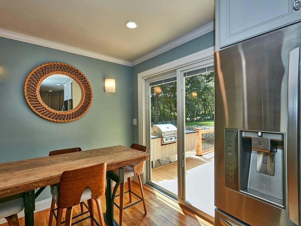 15 Highland Ridge Road Freetown, MA 02702 - Photo 20 of 42 a view of a dining room with furniture a chandelier and wooden floor