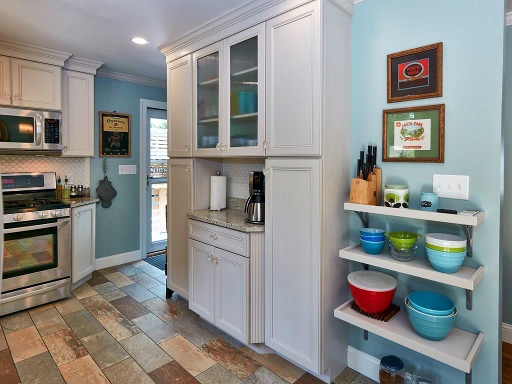 15 Highland Ridge Road Freetown, MA 02702 - Photo 22 of 42 a kitchen with stainless steel appliances granite countertop a sink and a stove
