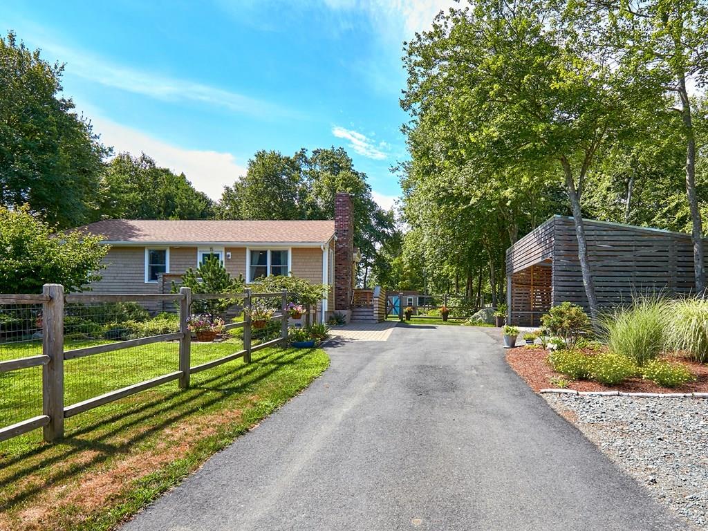 15 Highland Ridge Road Freetown, MA 02702 - Photo 3 of 42 a front view of a house with a yard