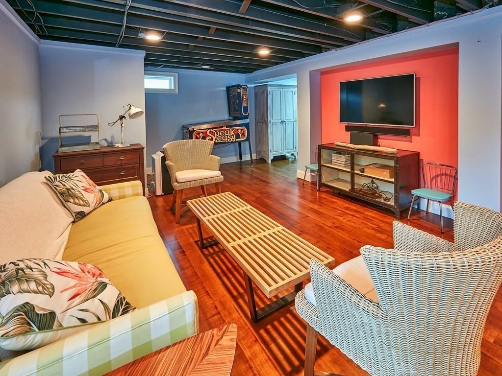 15 Highland Ridge Road Freetown, MA 02702 - Photo 35 of 42 a living room with furniture and a flat screen tv