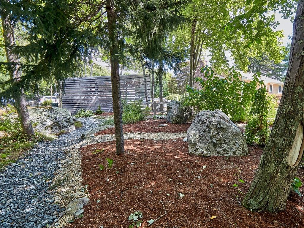 15 Highland Ridge Road Freetown, MA 02702 - Photo 6 of 42 a view of a tree in the middle of a yard
