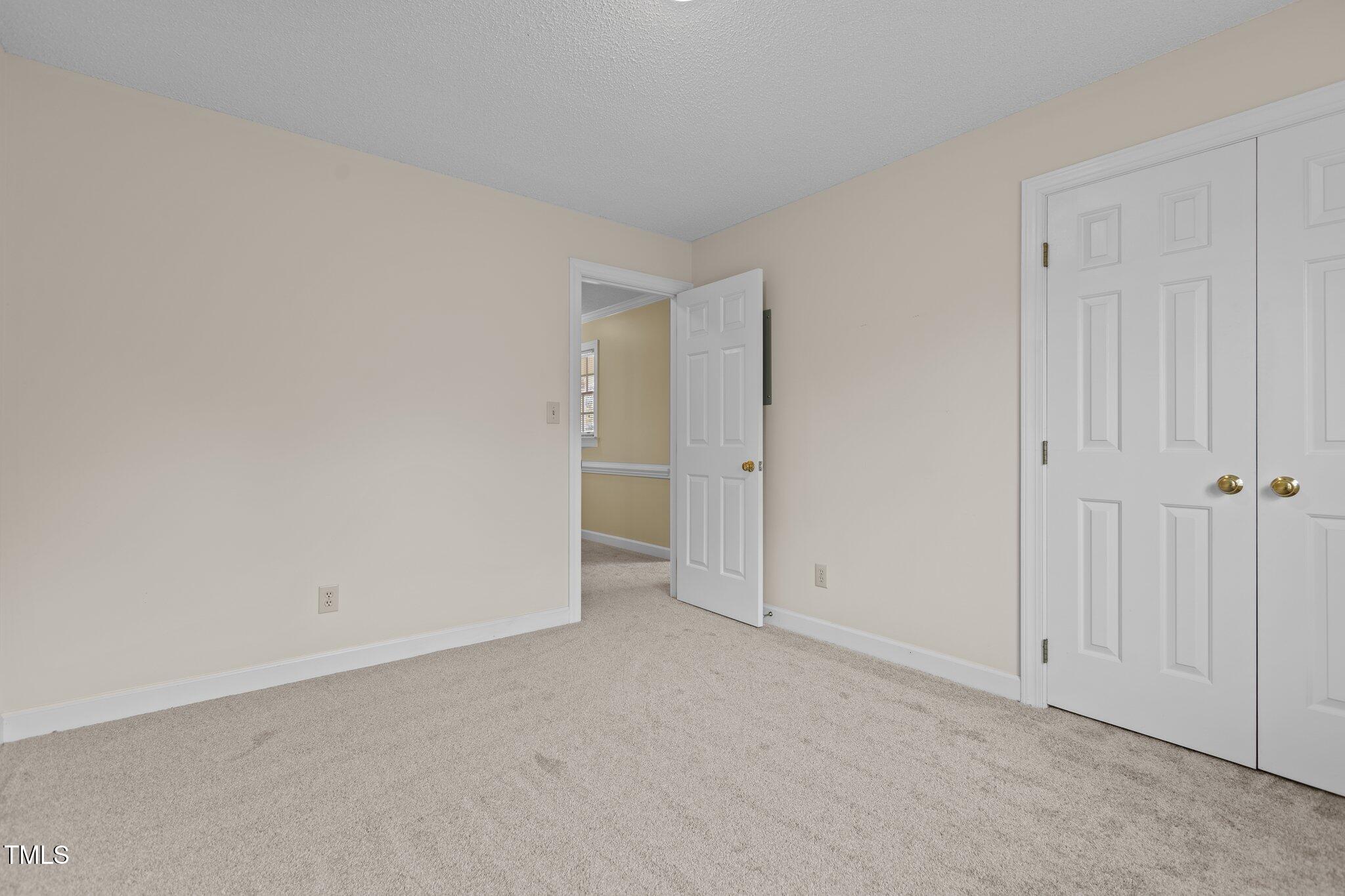 5940 Hampton Ridge Road Raleigh, NC 27603 - Photo 20 of 42 a view of an empty room