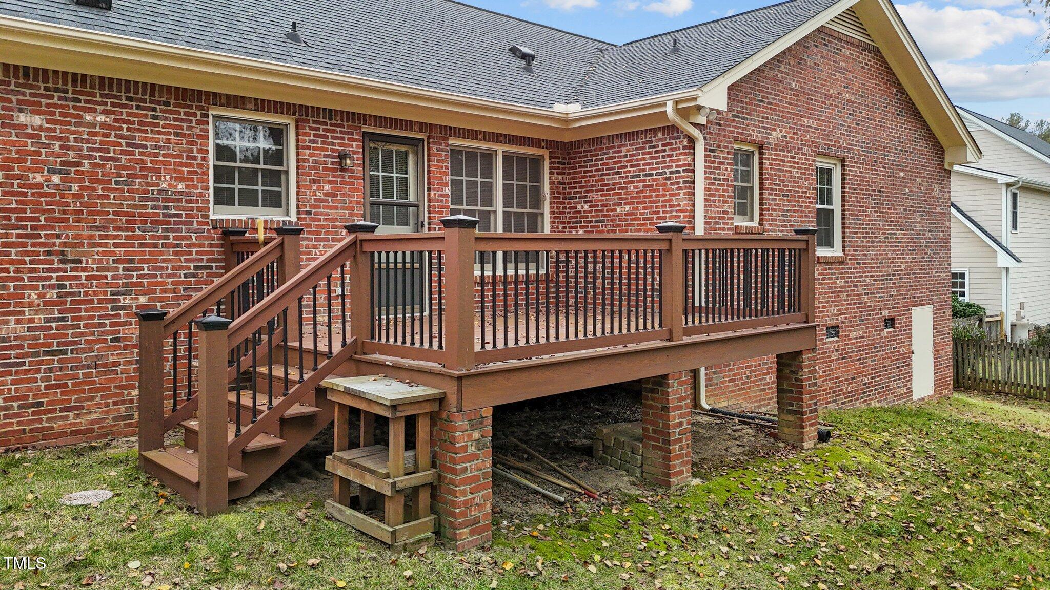 5940 Hampton Ridge Road Raleigh, NC 27603 - Photo 32 of 42 front view of a house with a small yard