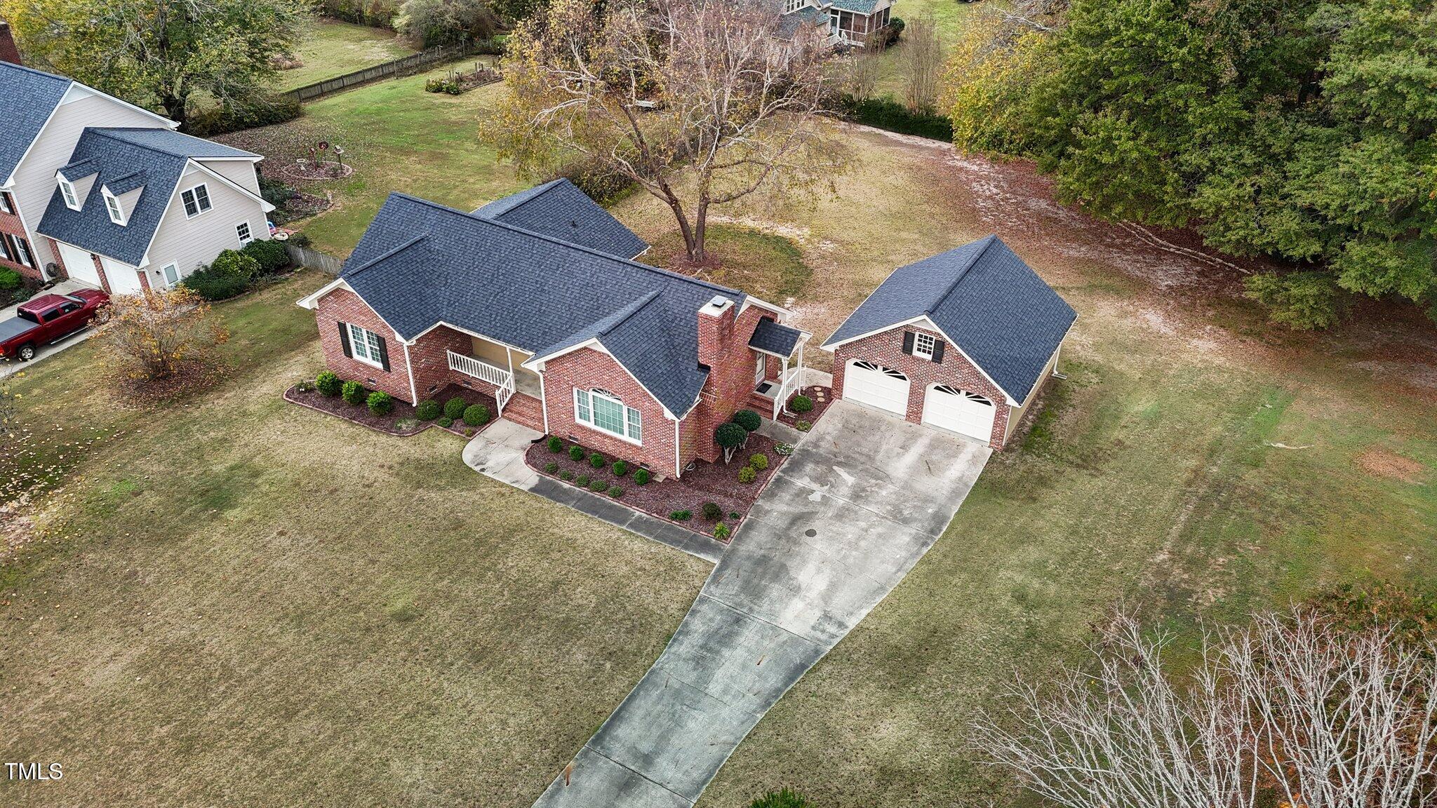 5940 Hampton Ridge Road Raleigh, NC 27603 - Photo 35 of 42 an aerial view of a house