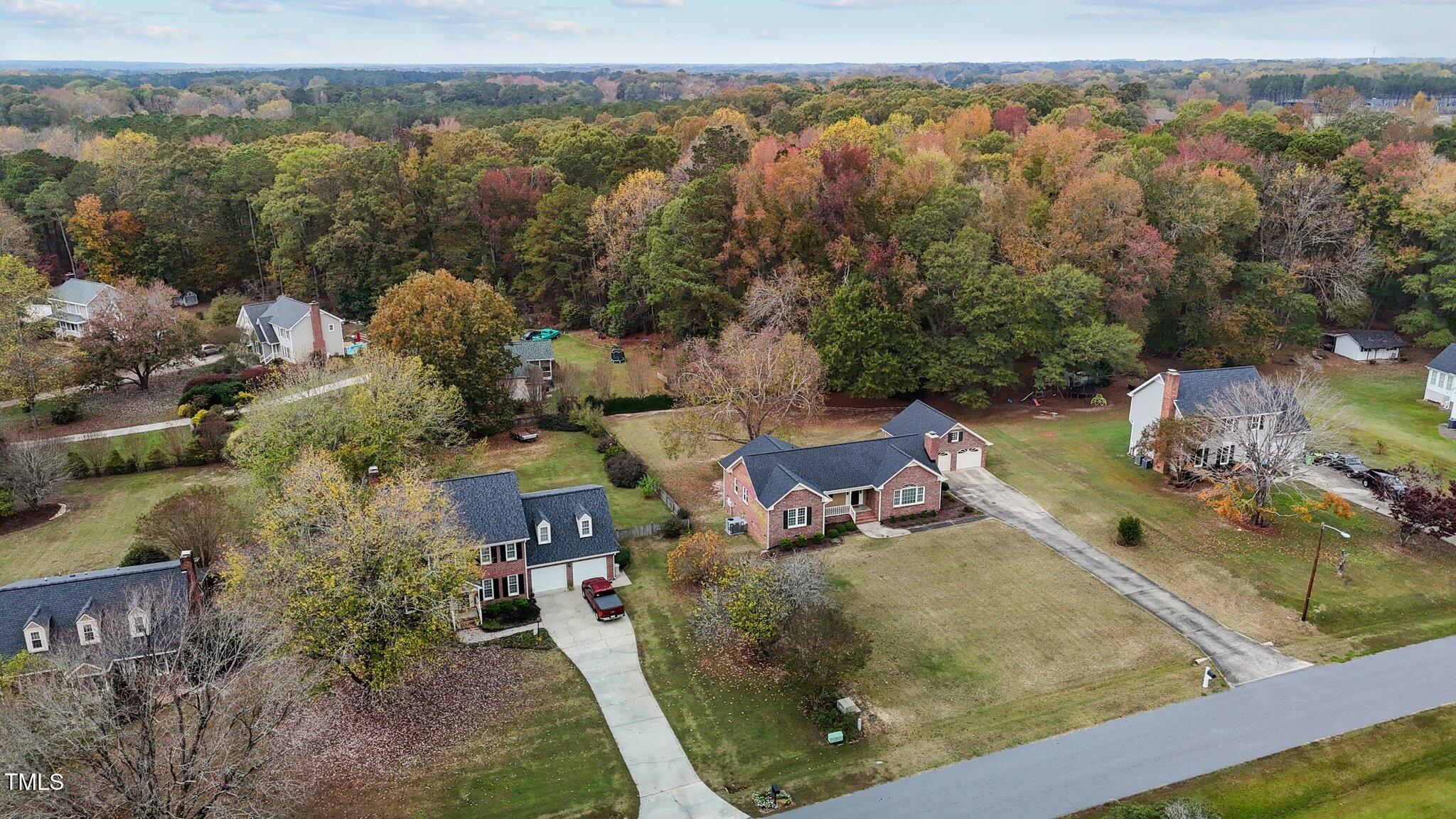 5940 Hampton Ridge Road Raleigh, NC 27603 - Photo 39 of 42 an aerial view of a house with a yard basket ball court and outdoor seating