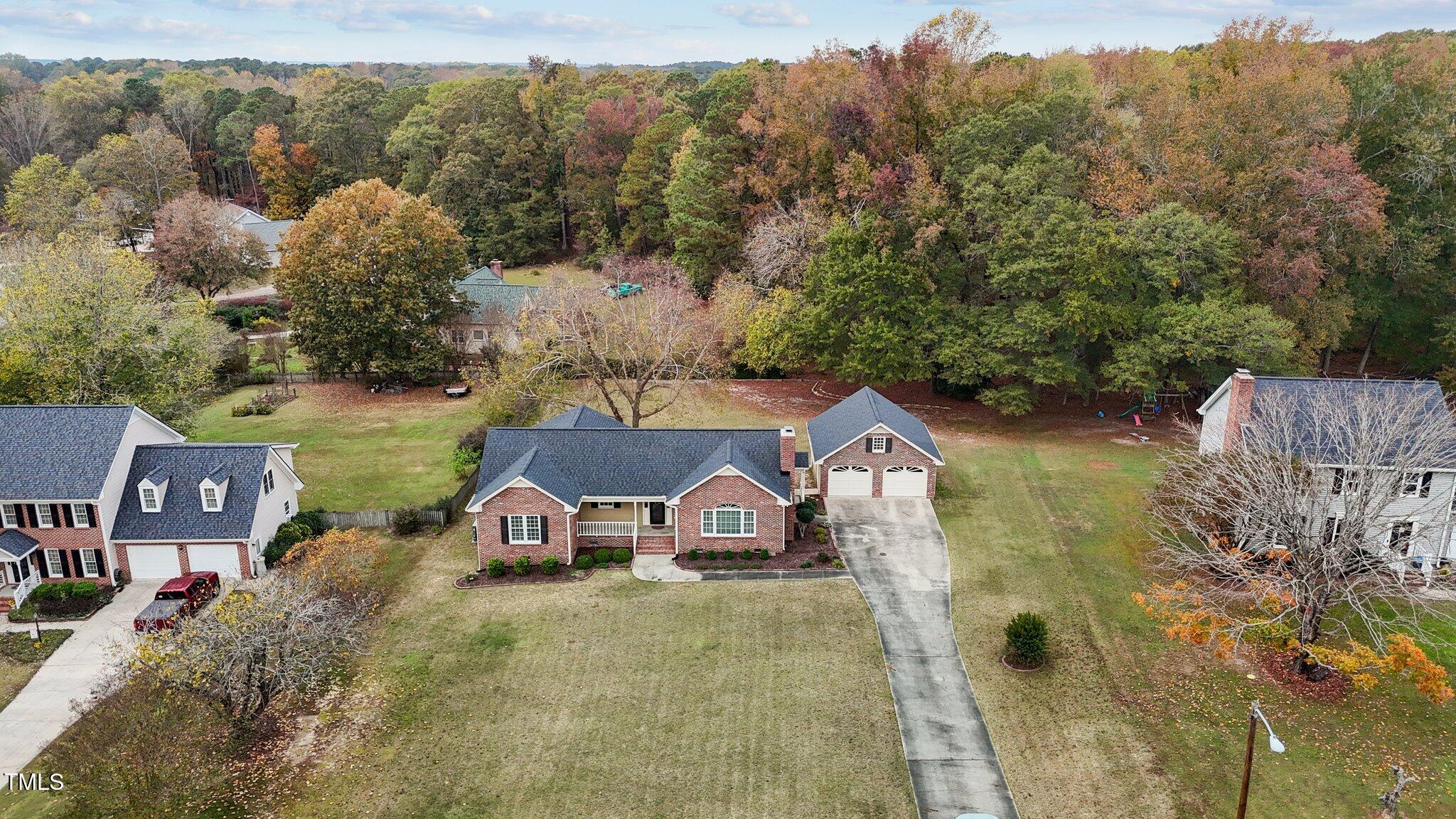 5940 Hampton Ridge Road Raleigh, NC 27603 - Photo 41 of 42 an aerial view of a house with big yard