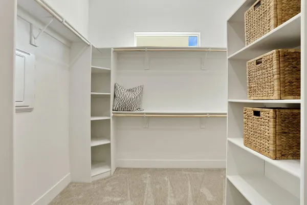 a view of walk in closet with window