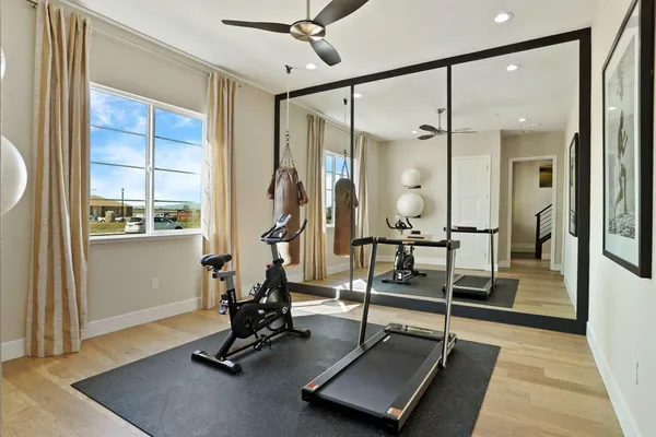 a view of a room with gym equipment