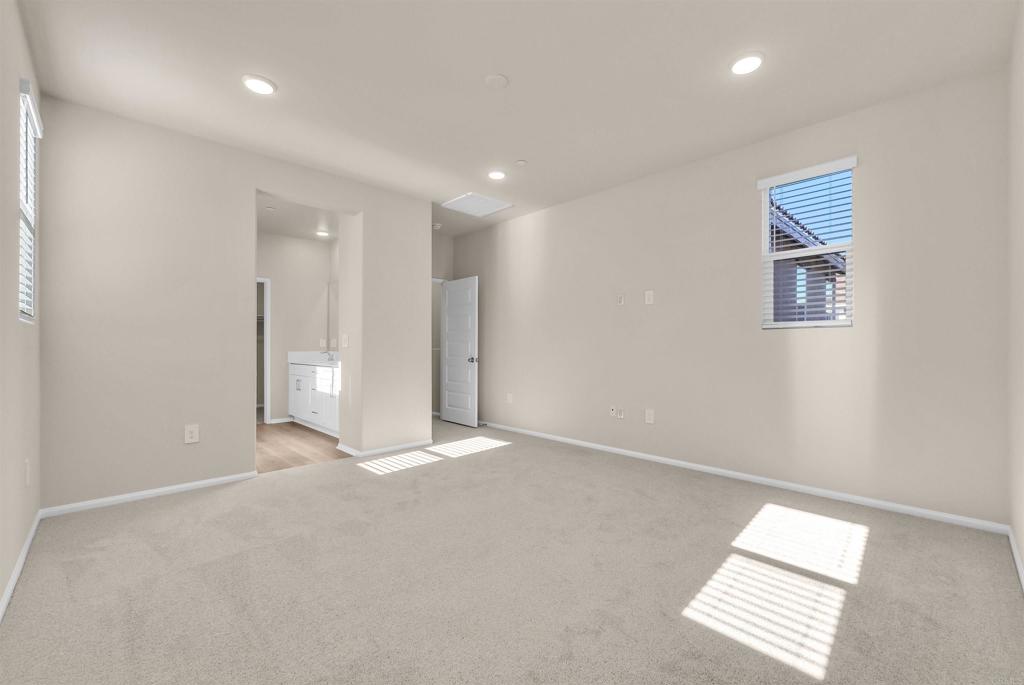 28381 Via Solero Temecula, CA 92591 - Photo 15 of 28 an empty room with windows and ceiling fan