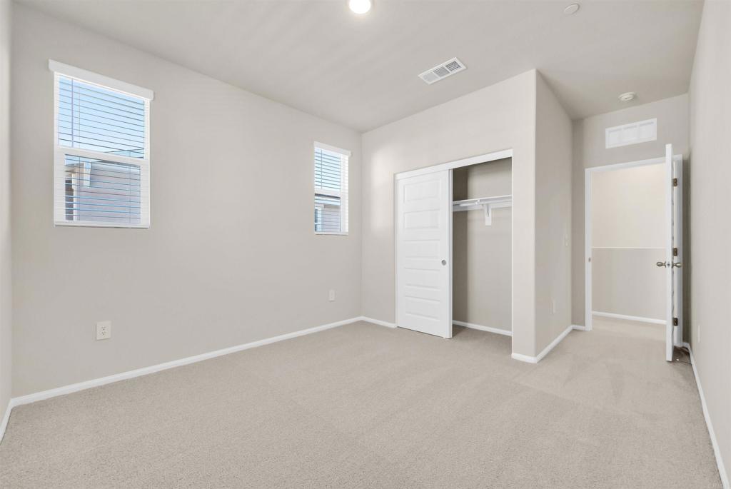 28381 Via Solero Temecula, CA 92591 - Photo 25 of 28 a view of an empty room with closet and a window