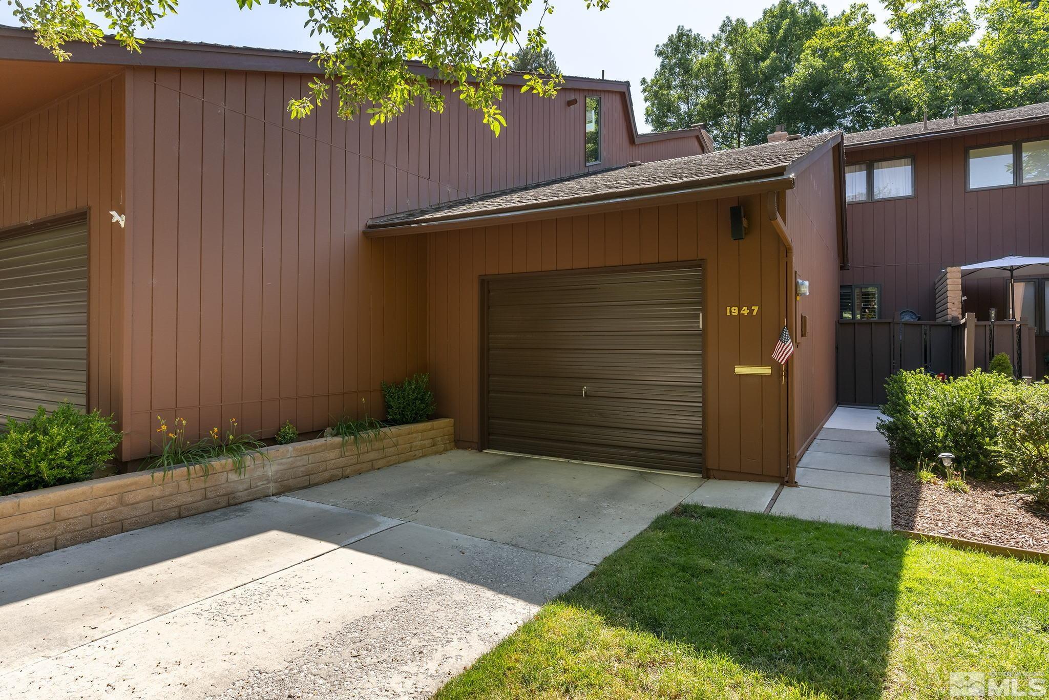 1947 South Villa Way Reno, NV 89509 - Photo 1 of 27 a backyard of a house with lots of green space