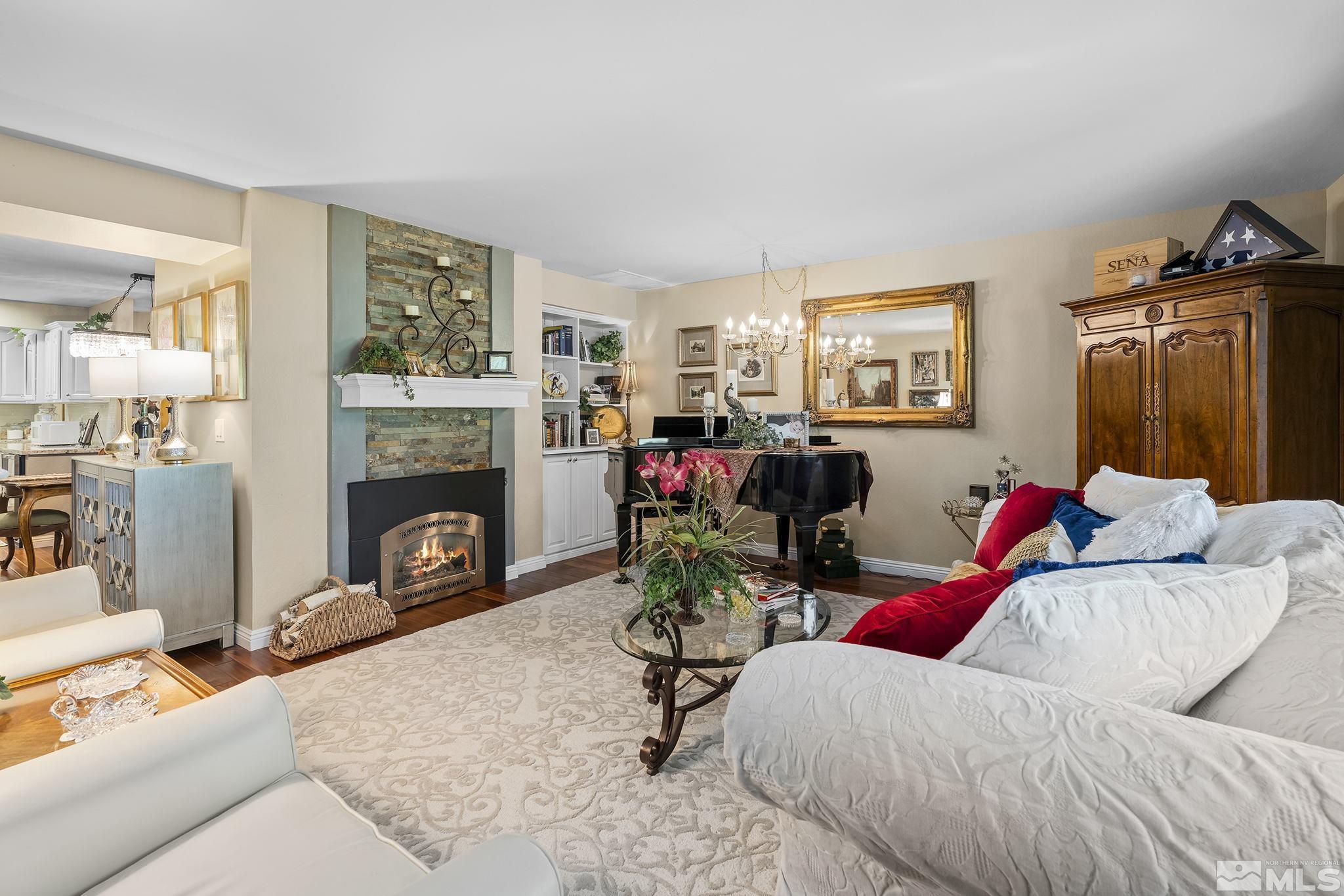 1947 South Villa Way Reno, NV 89509 - Photo 11 of 27 a living room with furniture and a fireplace