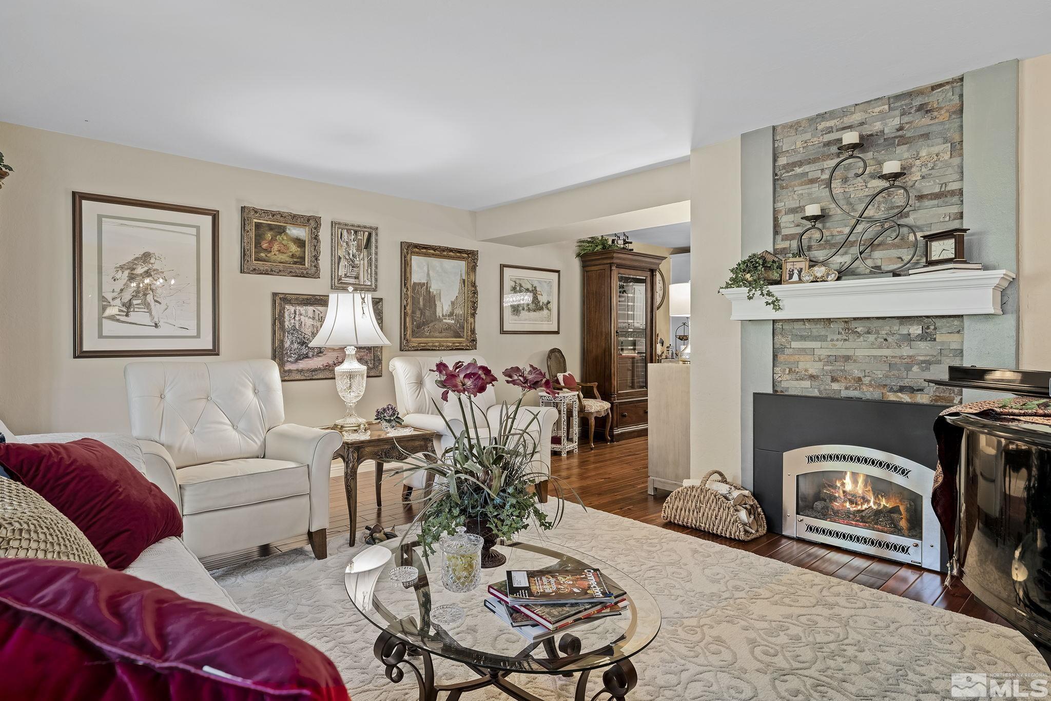 1947 South Villa Way Reno, NV 89509 - Photo 12 of 27 a living room with furniture or couch and a fireplace