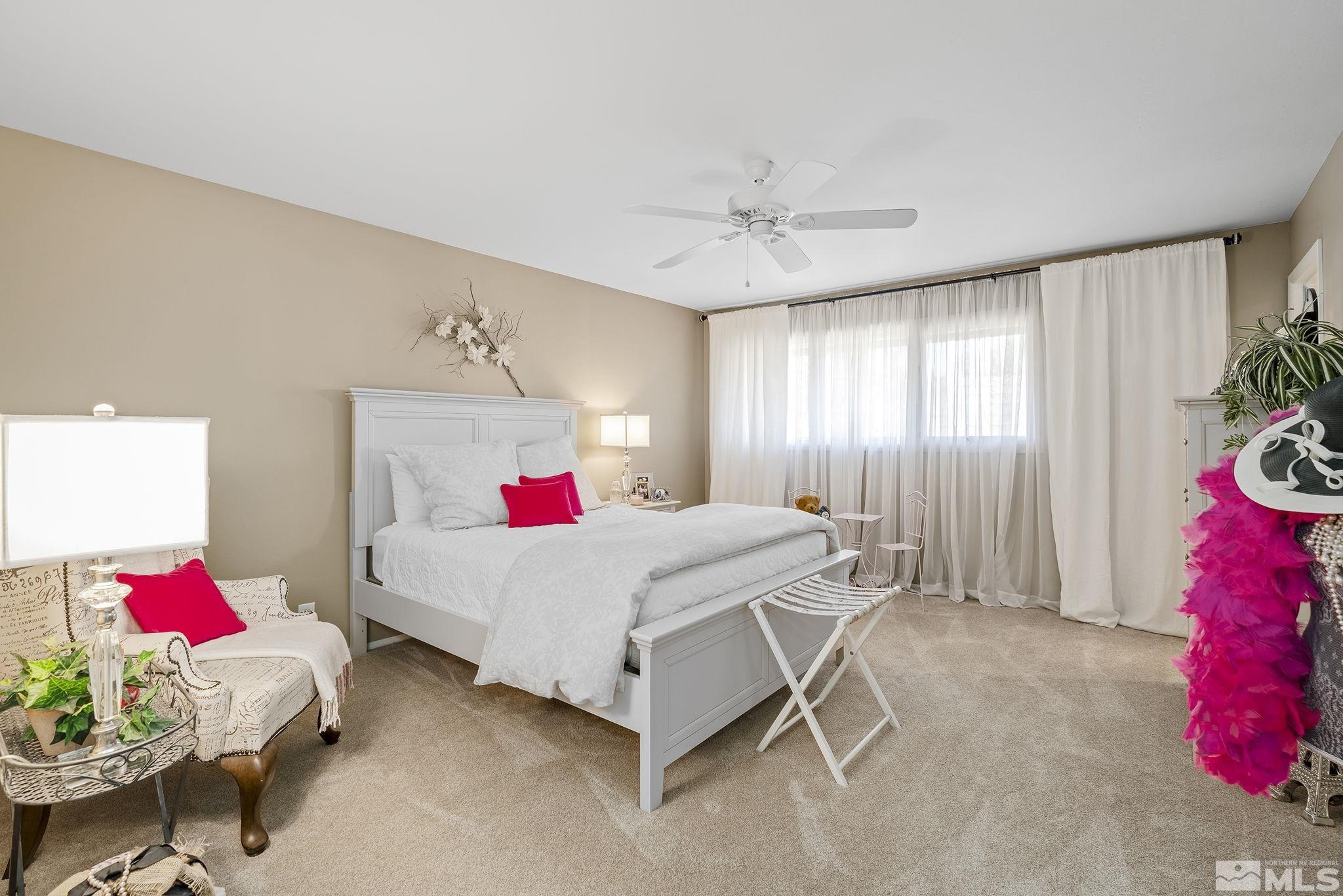 1947 South Villa Way Reno, NV 89509 - Photo 19 of 27 a bed room with a bed and a window