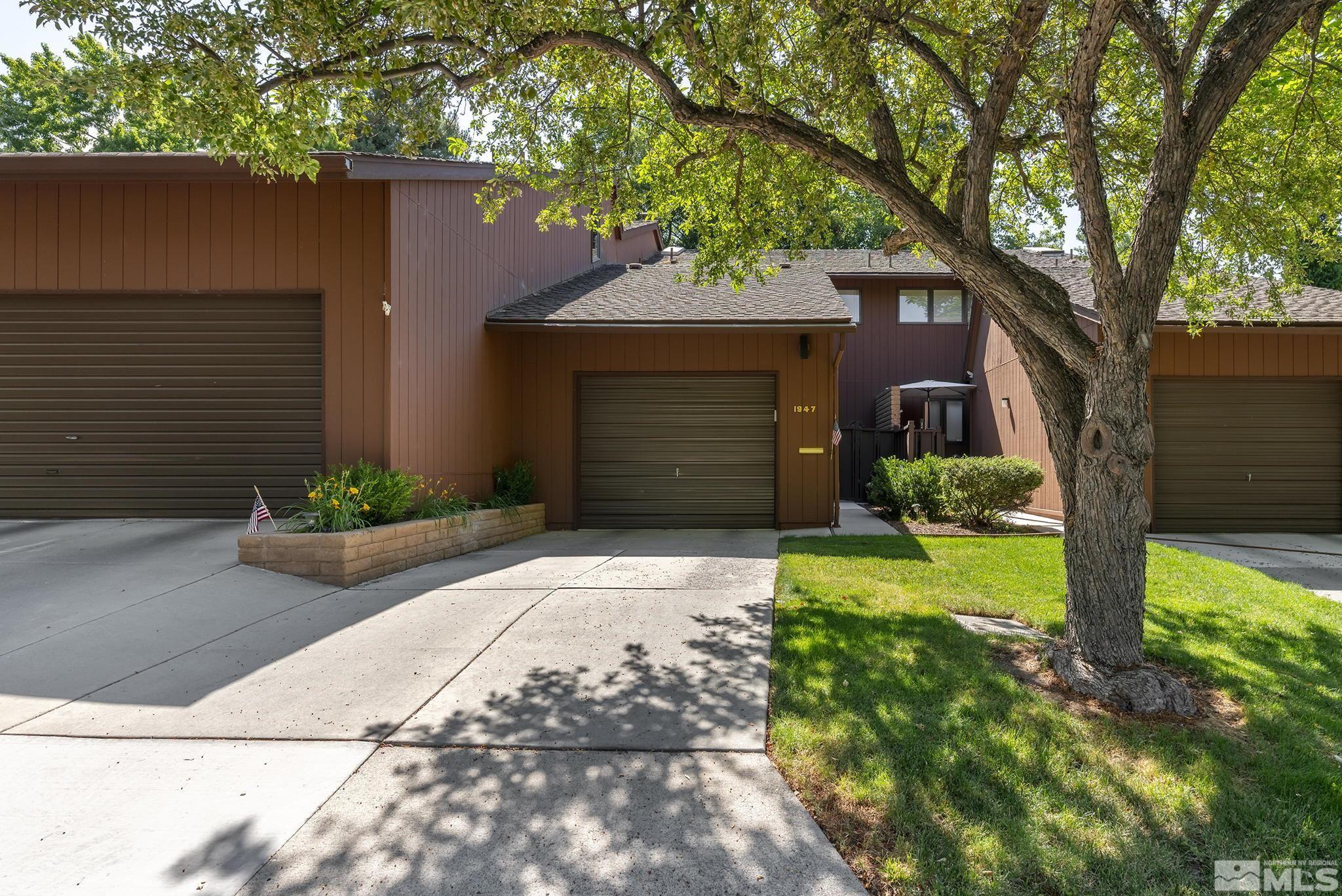 1947 South Villa Way Reno, NV 89509 - Photo 4 of 27 a front view of a house with garden