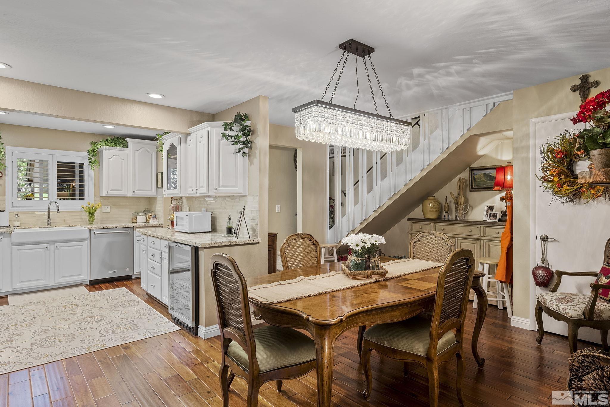 1947 South Villa Way Reno, NV 89509 - Photo 6 of 27 a view of a dining room with furniture and wooden floor