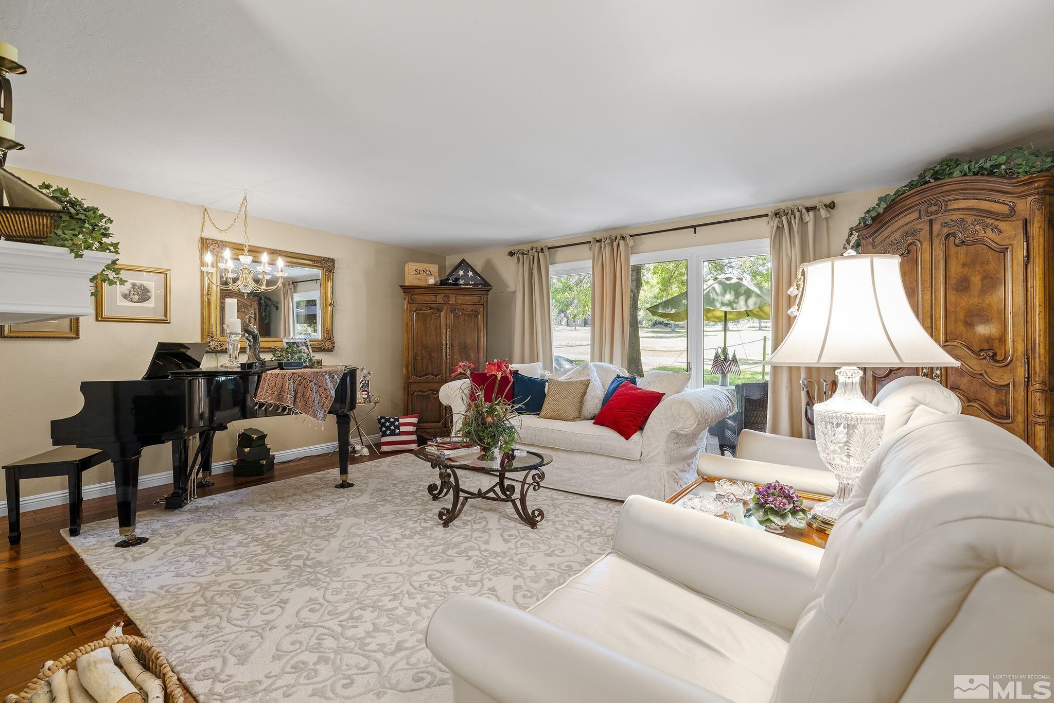 1947 South Villa Way Reno, NV 89509 - Photo 10 of 27 a living room with furniture and a large window