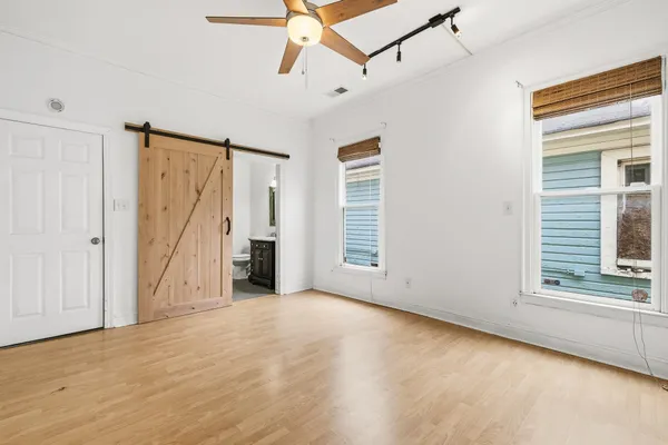 a view of an empty room with a window