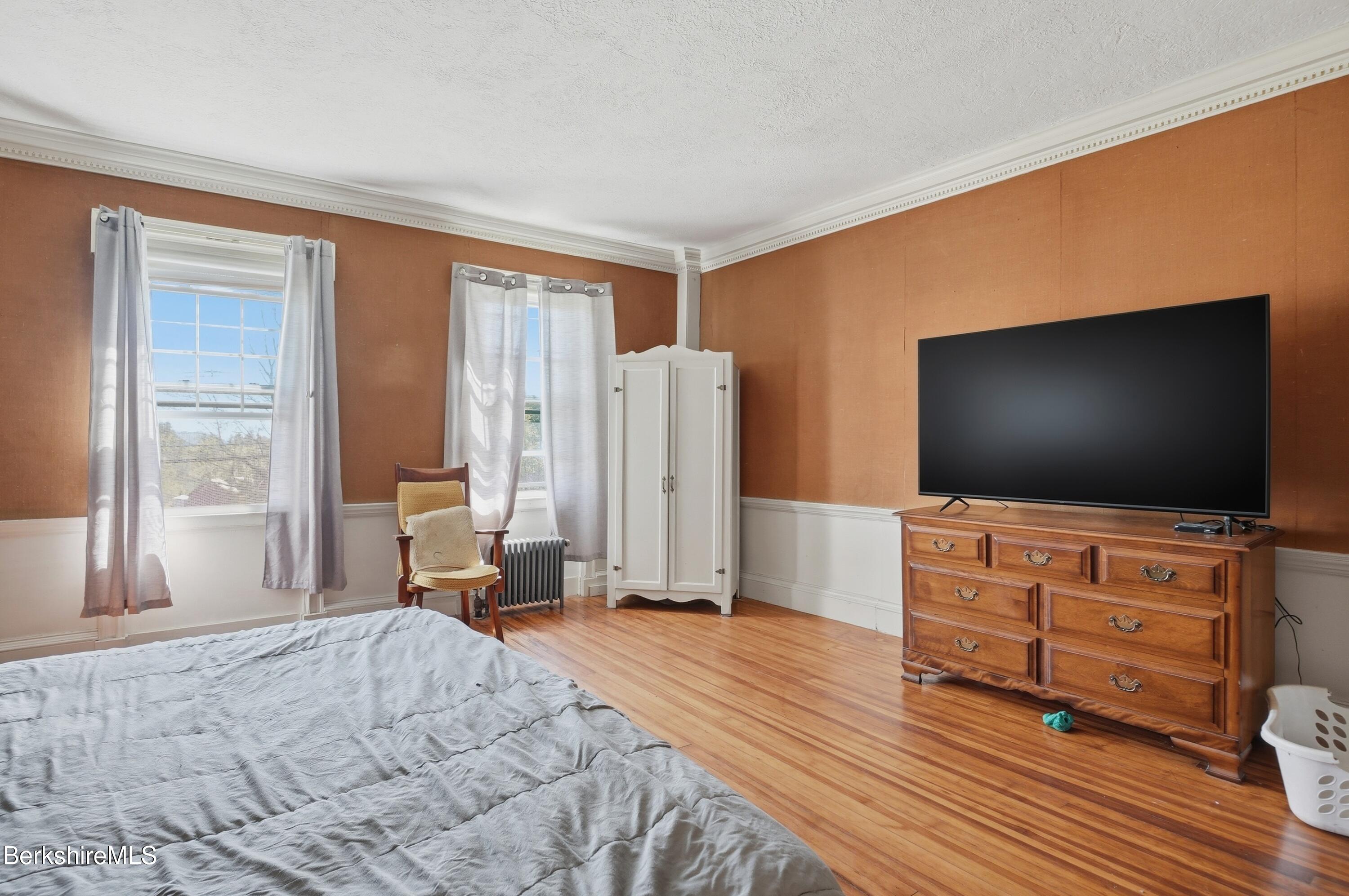 752 State Road Richmond, MA 01254 - Photo 23 of 71 a bedroom with furniture and flat screen tv