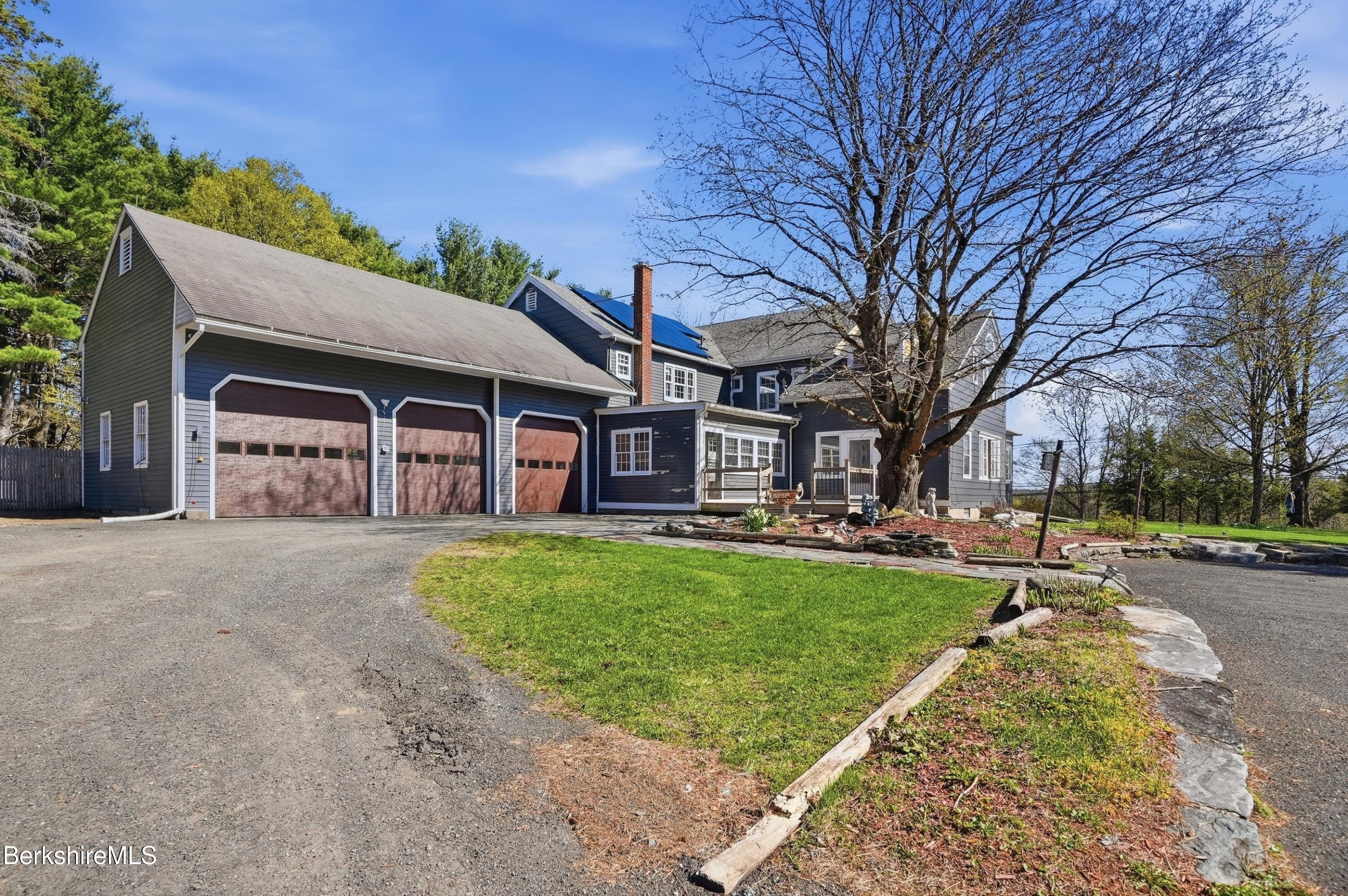 752 State Road Richmond, MA 01254 - Photo 8 of 71 a view of a big yard with plants and large trees