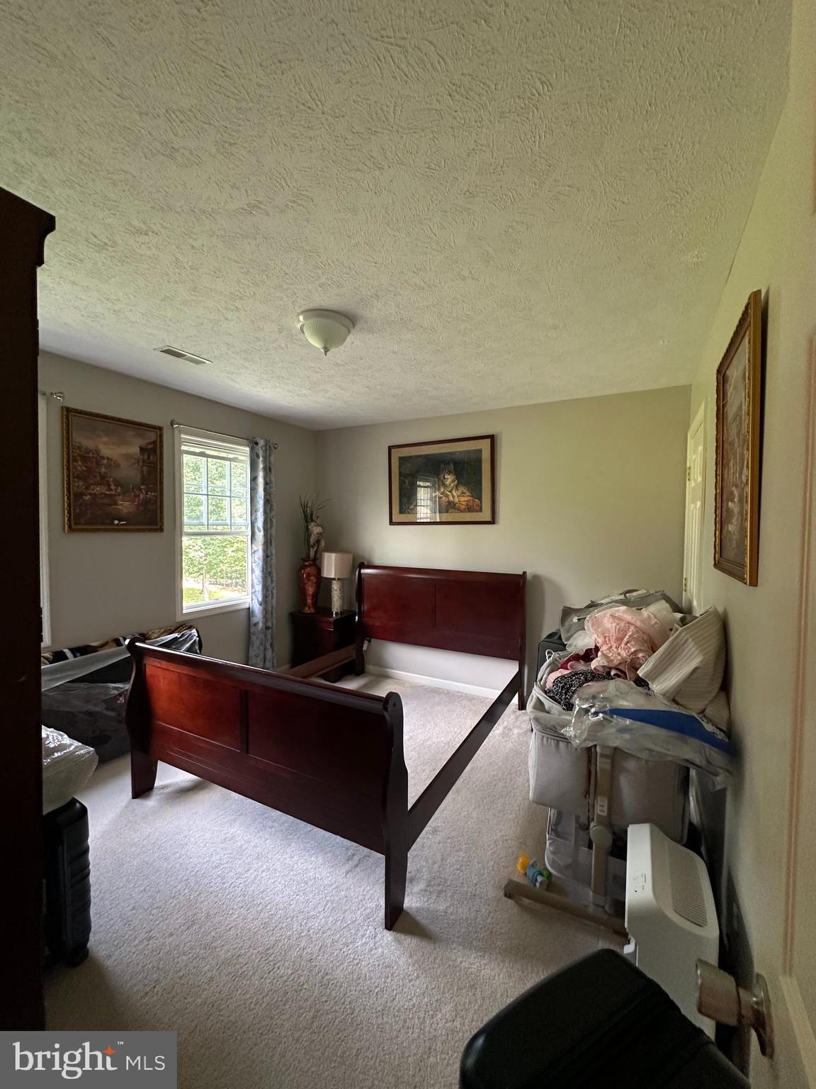 8470 Dunkard Church Road Rixeyville, VA 22737 - Photo 9 of 24 a living room with furniture gym equipment and a window