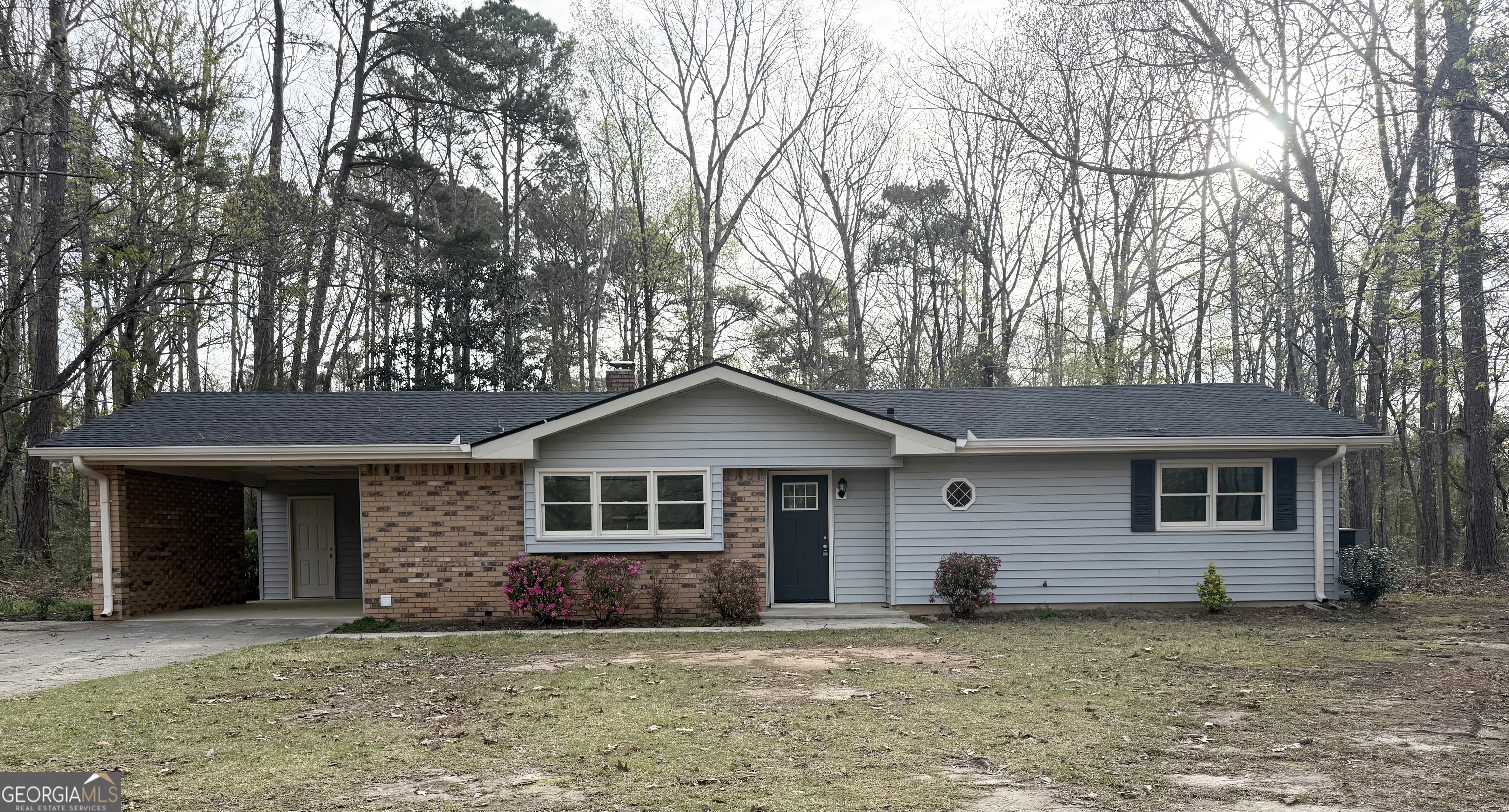 402 Ginger Circle LaGrange, GA 30240 - Photo 1 of 1 a front view of a house with a yard