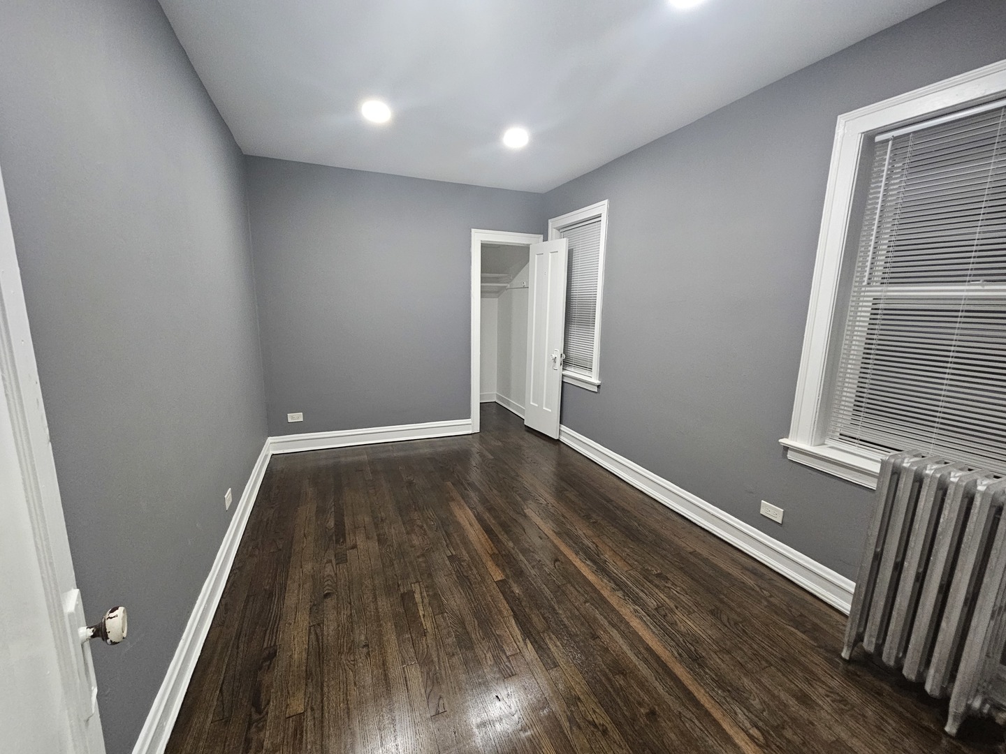 6545 North Francisco Avenue, Unit 1A Chicago, IL 60645 - Photo 8 of 12 a view of wooden floor in an empty room