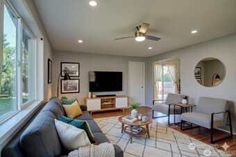1214 36th Street Anacortes, WA 98221 - Photo 13 of 23 a living room with furniture and a flat screen tv