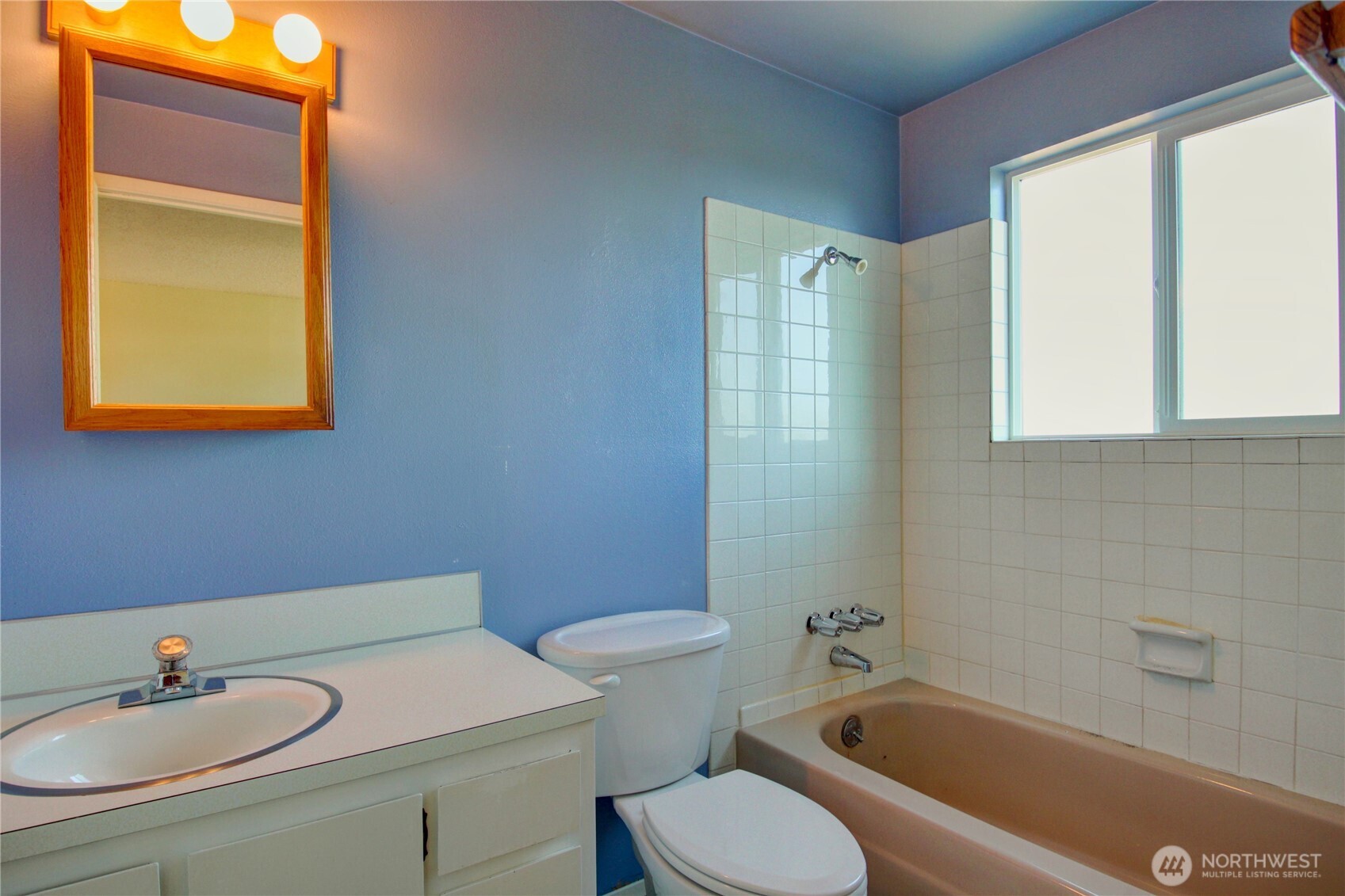 1214 36th Street Anacortes, WA 98221 - Photo 17 of 23 a bathroom with a sink a toilet and shower