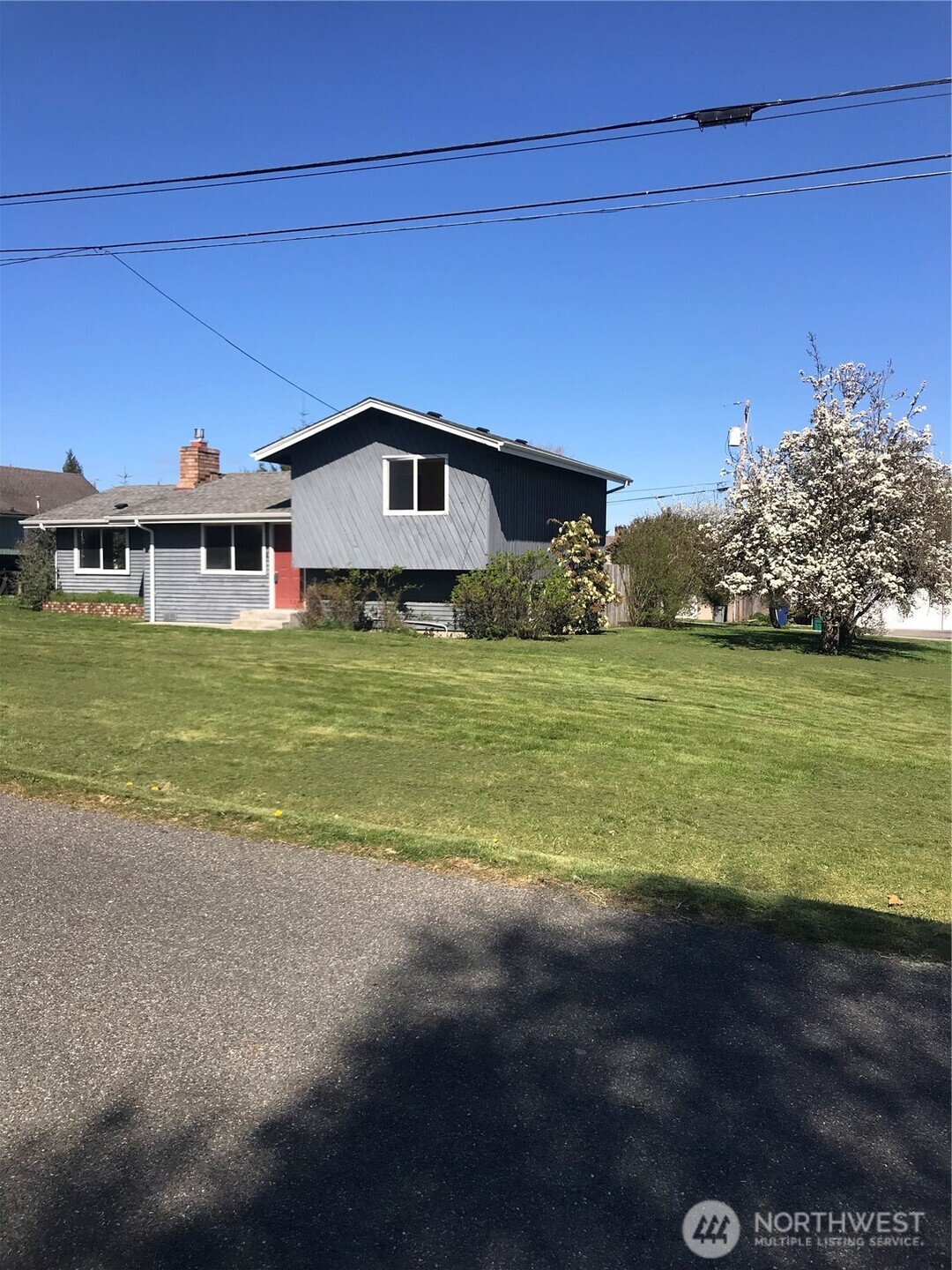 1214 36th Street Anacortes, WA 98221 - Photo 21 of 23 a house with a big yard