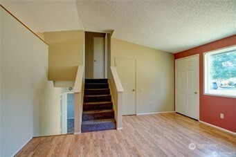 1214 36th Street Anacortes, WA 98221 - Photo 9 of 23 a view of entryway and hall with wooden floor