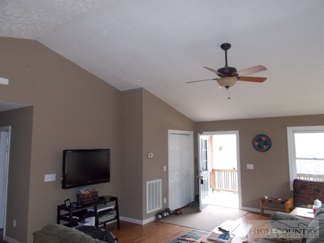 191 V L Moretz Road Deep Gap, NC 28618 - Photo 4 of 7 a living room with furniture and a flat screen tv