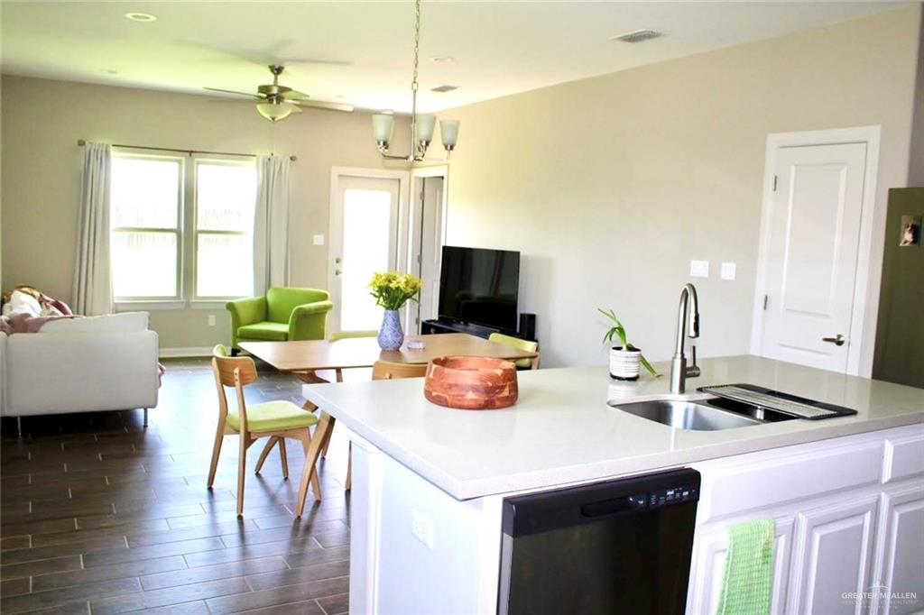 708 South Tecate Drive Mission, TX 78572 - Photo 6 of 10 a kitchen with sink and view of living room