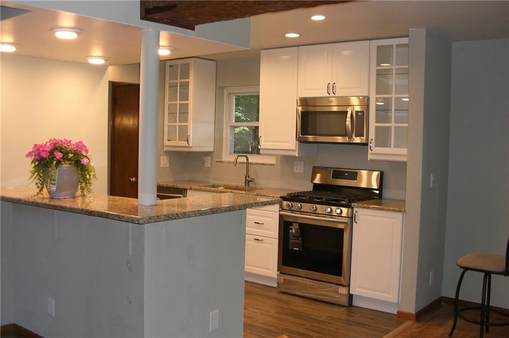 1200 Woodland Road Pittsburgh, PA 15237 - Photo 4 of 7 Open Floor Plan to the Kitchen