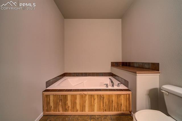 13615 Mc Cune Road Elbert, CO 80106 - Photo 29 of 31 Primary adjoined full bathroom with soaking tub.