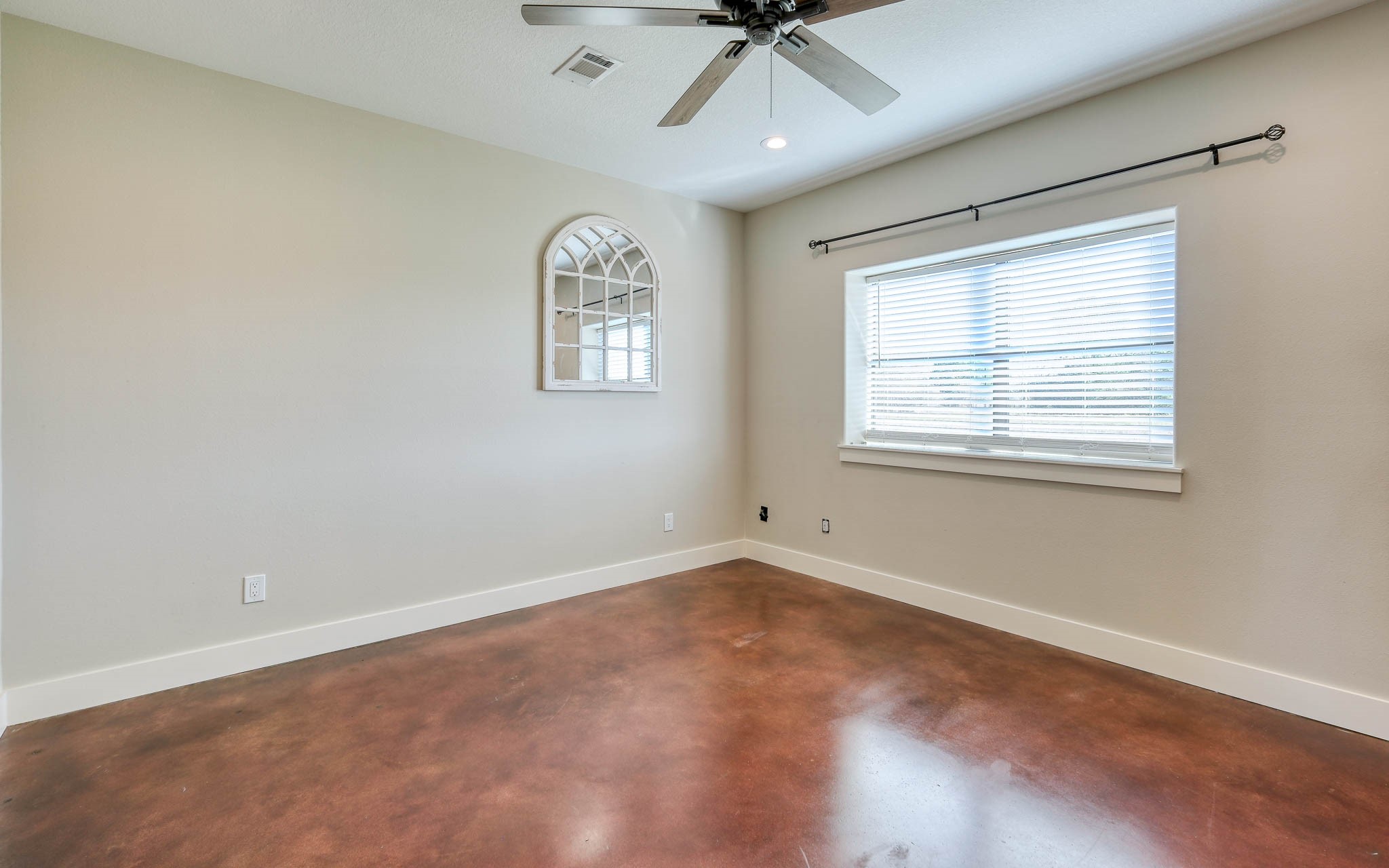 40934 Thomas Lane Hempstead, TX 77445 - Photo 18 of 50 an empty room with a window and a ceiling fan